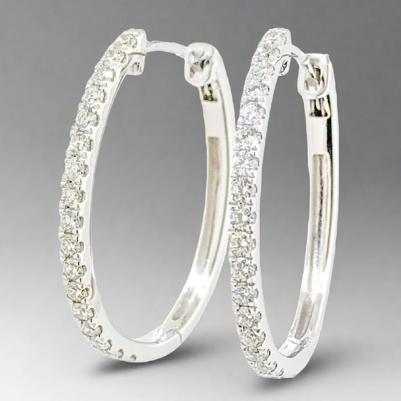 Hoop earrings with diamond-cut surfaces for added sparkle and shine-14K W Gold 0.50ctw H-I/SI1 Diamond Oval Hoops