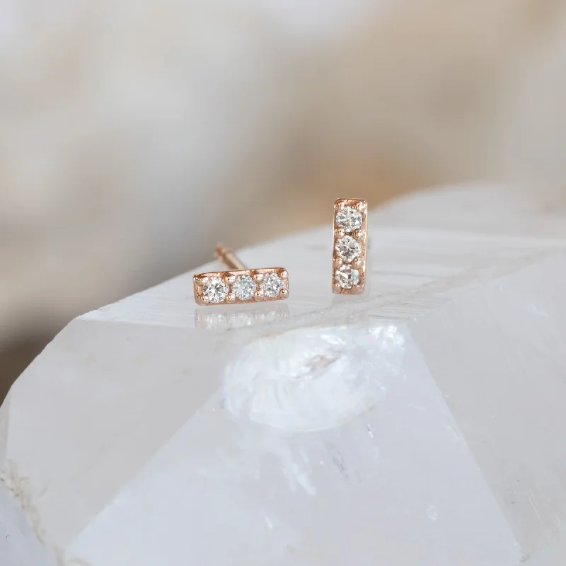 Hoop earrings with abstract shapes for an artistic and creative touch-The Teensy White Diamond Bar Studs | 14K Rose Gold