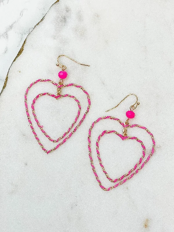 Hoop earrings with textured gold for a refined and sophisticated aesthetic-Wrapped Double Heart Dangle Earrings - Pink