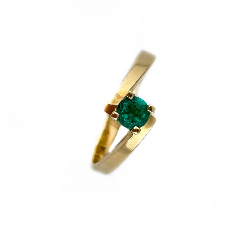 Rings with twisted rose gold band designs -Emerald Solitaire Ring