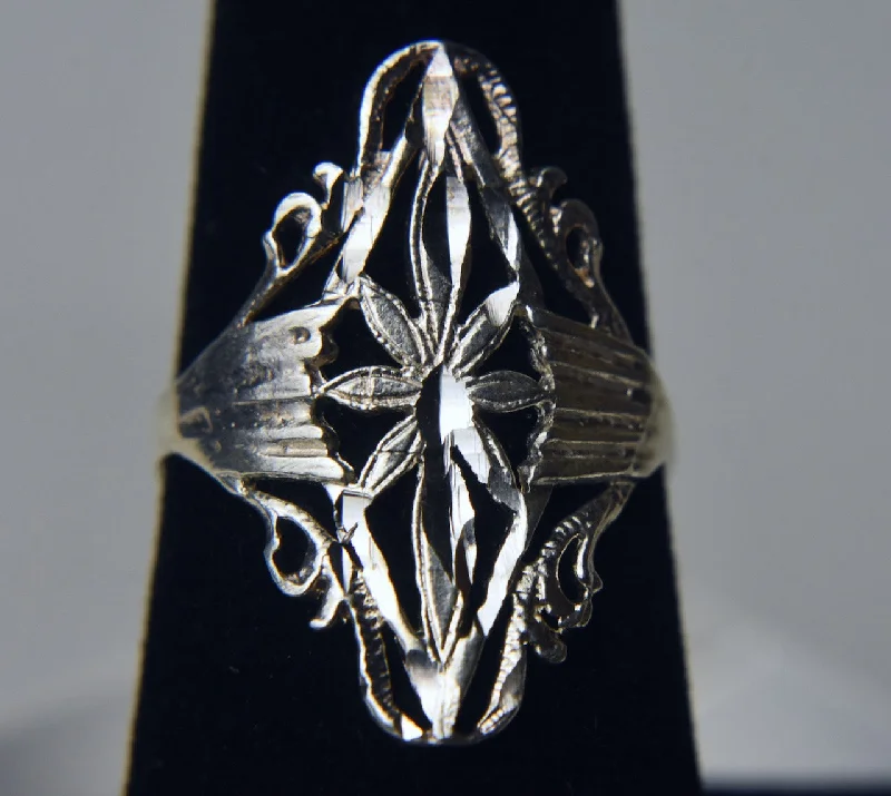 Rings with hematite for sleek metallic sheen -Sterling Silver Pierced Starburst Design Ring